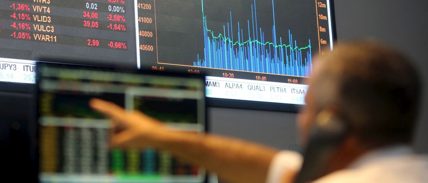 Dólar cai e Bolsa sobe com maior disposição do investidor a tomar risco
