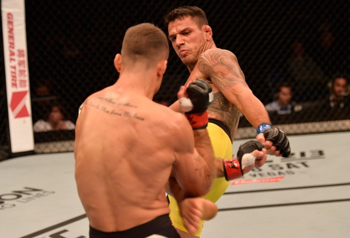 À vontade na estreia em nova divisão, Rafael dos Anjos domina Saffiedine